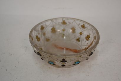 A rock-crystal heel cup decorated with red,...