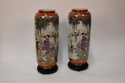 Pair of porcelain flanged vases decorated...
