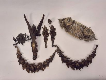 Set of seven decorative bronze elements



A...