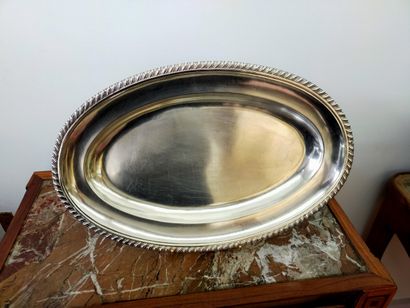 Three silver dishes: one round, two oval...