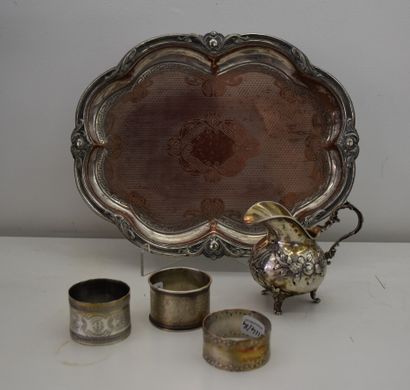 Silver lot including : a milk jug and three...