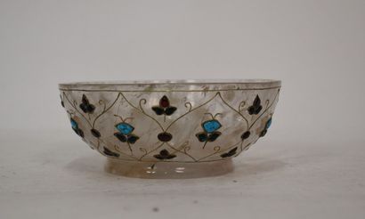 A rock-crystal heel cup decorated with red,...