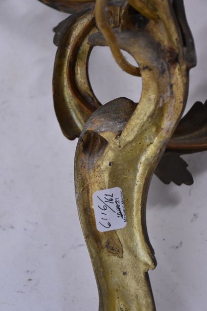 Two pairs of rocaille sconces in chased and...