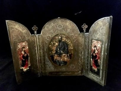 Triptych, travel icon in bronze opening on...