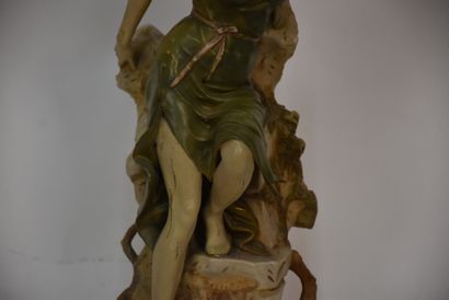 Polychrome ceramic vase with female figure

Royal...
