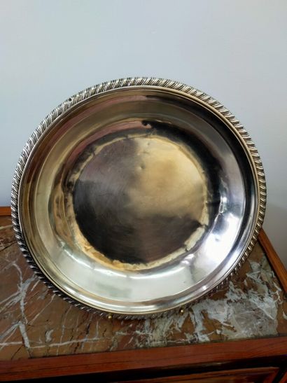 Three silver dishes: one round, two oval...