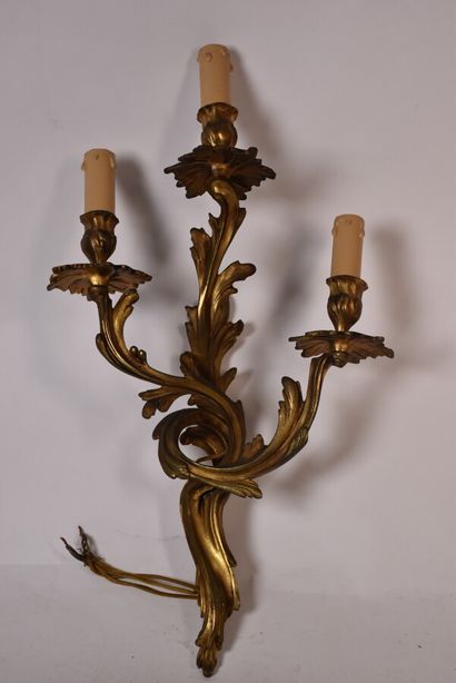 Two pairs of rocaille sconces in chased and...
