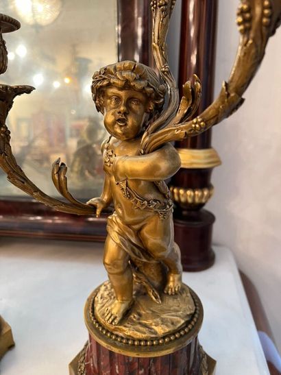 D'après CLODION et DELARUE

Paire de candélabres...