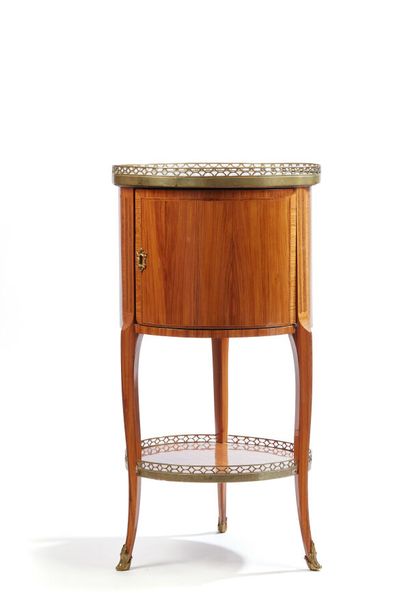 Table de salon de forme tambour en placage...
