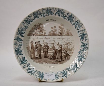 JEUX DE BOULE.

Plateau rond en faience de...