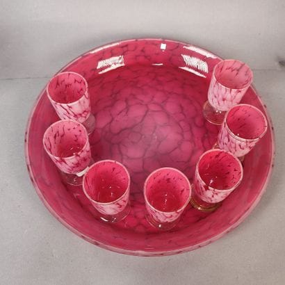 Pink lined glass port wine set
Round tray...