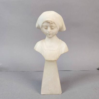 Statuette of a young girl with a white marble...