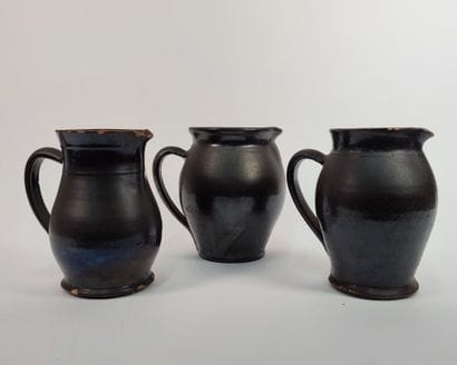 Set of glazed ceramic pitchers