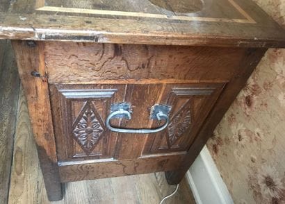 Carved oak chest
Seal and coat of arms in...