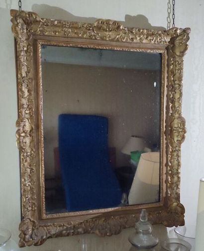 Wood and gilded stucco mirror in the Louis...