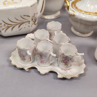 Part of service in white porcelain with gold...