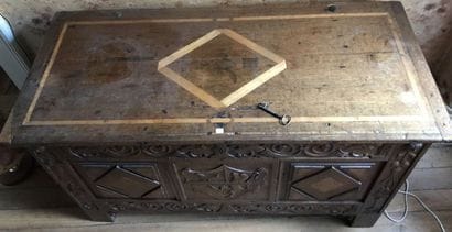 Carved oak chest
Seal and coat of arms in...