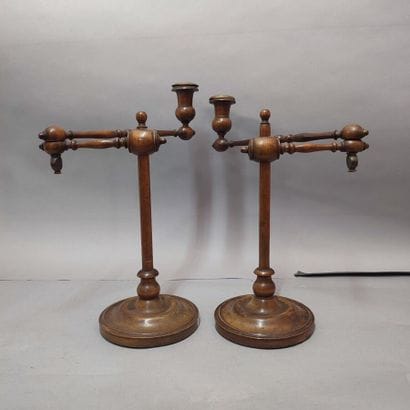 Pair of articulated candlesticks in turned...