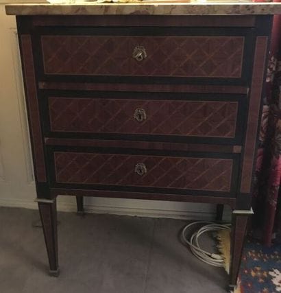 Small chest of drawers inlaid with diamonds...