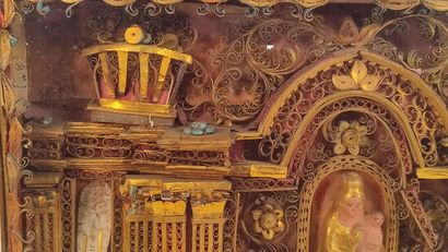 Reliquary frame with paperoles representing...