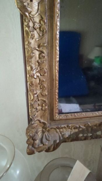 Wood and gilded stucco mirror in the Louis...
