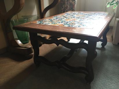 Natural wood coffee table
Ceramic tiles
Louis...