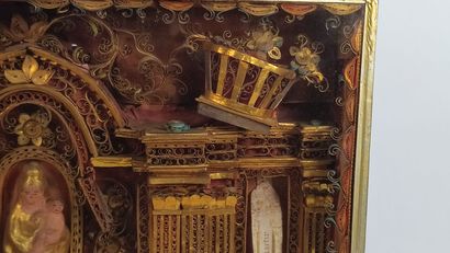 Reliquary frame with paperoles representing...