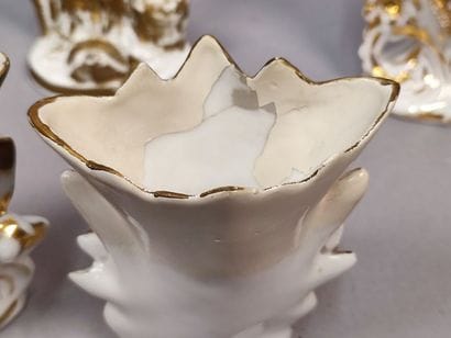 Pair of small vases decorated with a flowering...