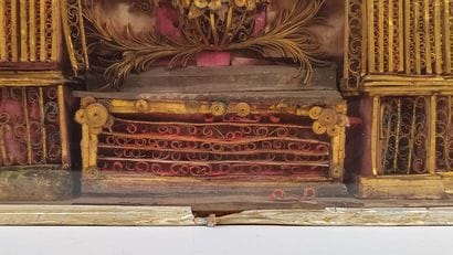 Reliquary frame with paperoles representing...