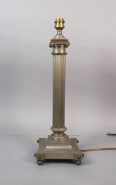 Tapered and fluted column lamp in silver...
