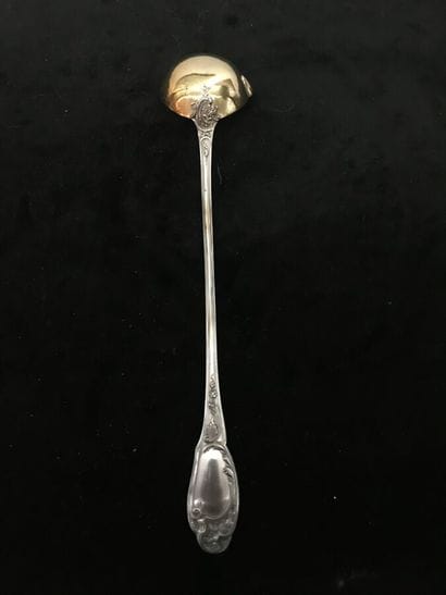 Cream ladle in silver and vermeil with rocaille...