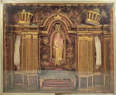 Reliquary frame with paperoles representing...