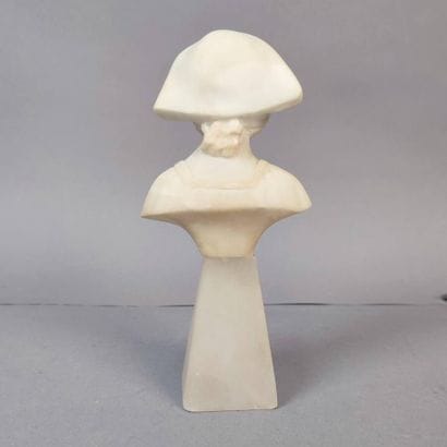 Statuette of a young girl with a white marble...