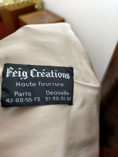 FEIG CREATIONS
Coat in white mink
Two pockets,...