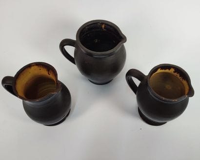 Set of glazed ceramic pitchers