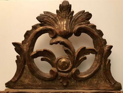 Wood and gilded paste mirror with parecloses,...