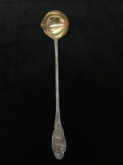 Cream ladle in silver and vermeil with rocaille...