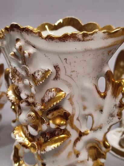 Pair of small vases decorated with a flowering...