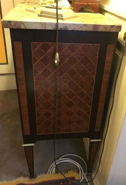 Small chest of drawers inlaid with diamonds...