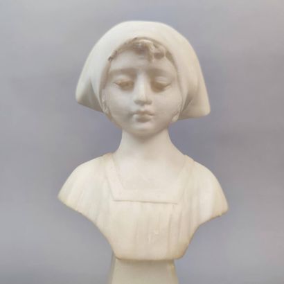 Statuette of a young girl with a white marble...
