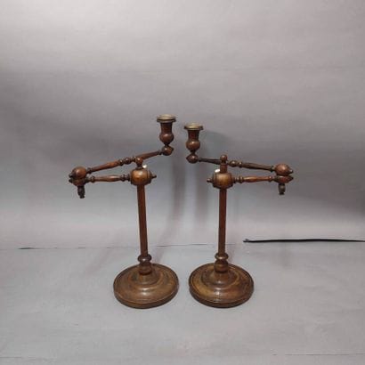 Pair of articulated candlesticks in turned...