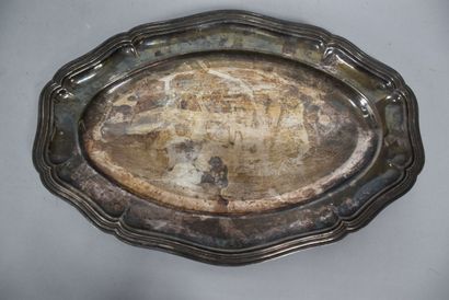 Silver plated metal dish with a curved s...