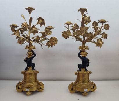 Pair of gilt bronze candelabras decorated...