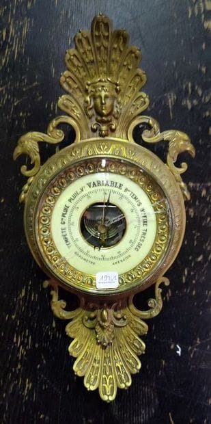 Bronze barometer with mascarons decoration,...