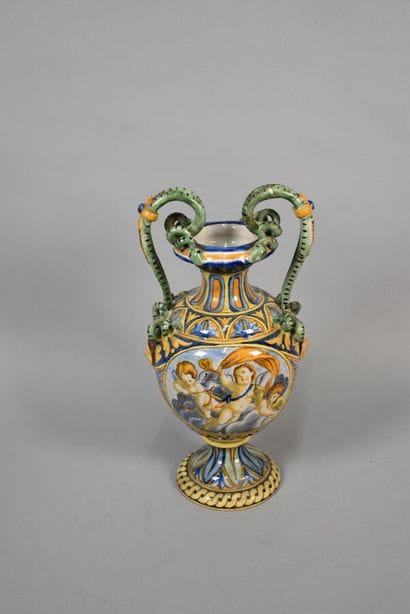 Pair of vases in the taste of Italian majolica...