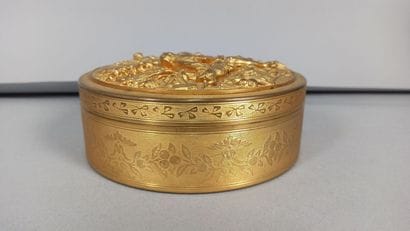 Circular box in gilded metal decorated with...