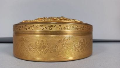 Circular box in gilded metal decorated with...