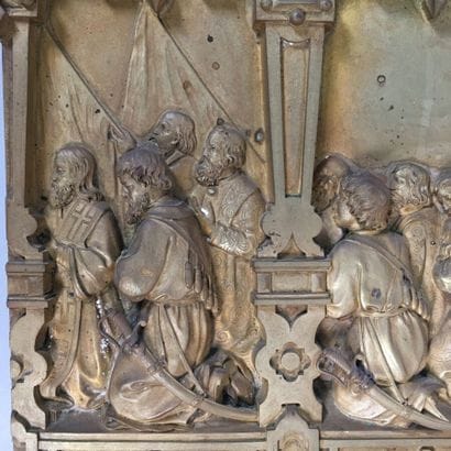 Bronze plaque with bas-relief decoration...
