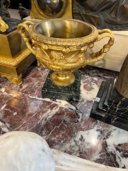 A chased and gilded bronze crater vase decorated...