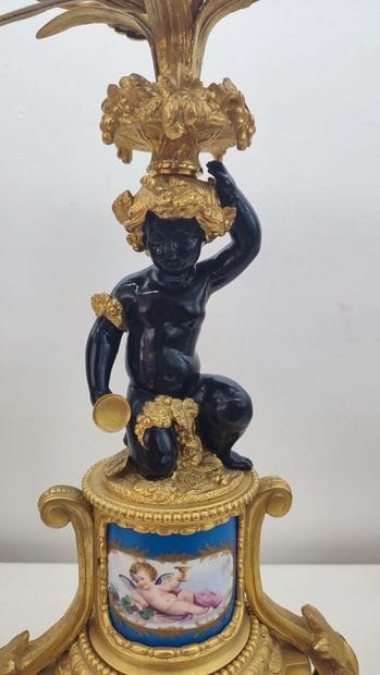 Pair of gilt bronze candelabras decorated...